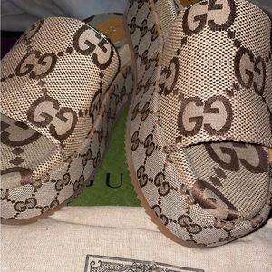 Gucci platform slides wear only once like new comes with original box & bust bag